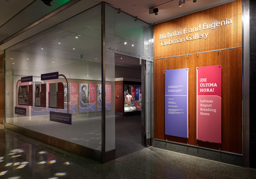 As visitors enter the gallery, they hear a familiar voice coming from a bilingual video: 
