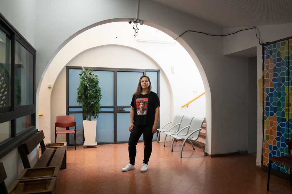 Myada Abu Khaled, an educator and Palestinian citizen of Israel, stands in the community center in Lod.