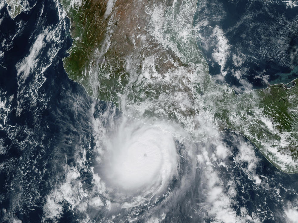 This satellite image provided by NOAA on Tuesday shows Hurricane Otis approaching Mexico's Pacific coast near Acapulco.