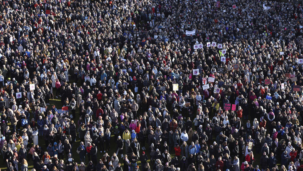 People across Iceland gather during the women's strike in Reykjavik, Iceland, Tuesday, Oct. 24, 2023. Iceland's prime minister and women across the island nation are on strike to push for an end to unequal pay and gender-based violence.