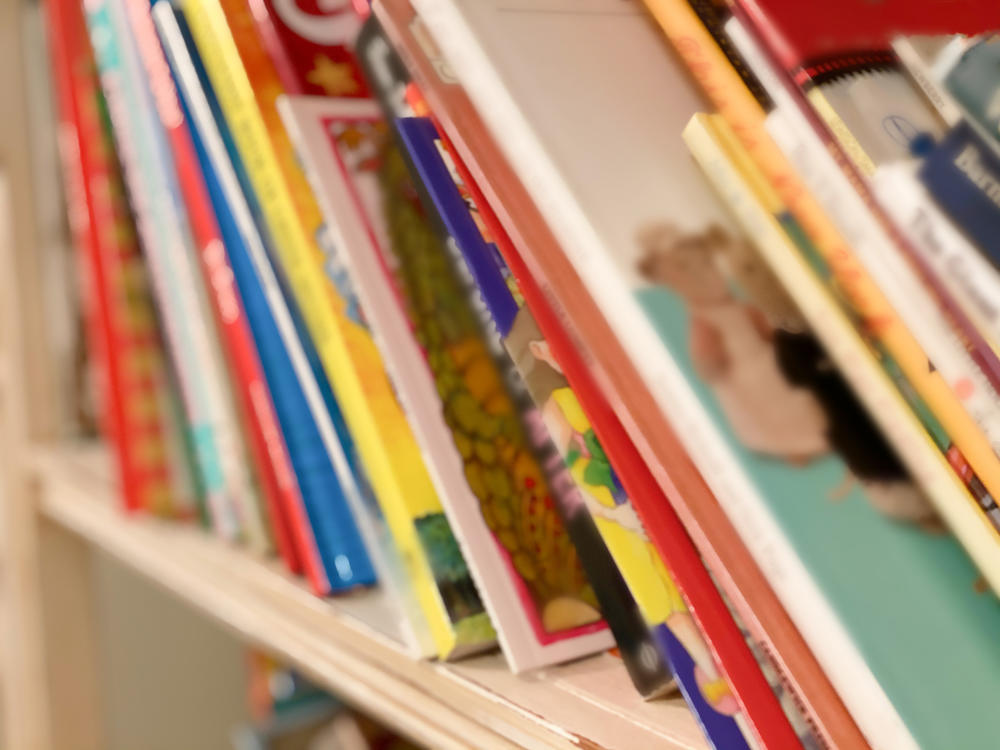 Scholastic says it will stop offering the controversial collection of race- and gender-related titles at middle school book fairs starting in January.