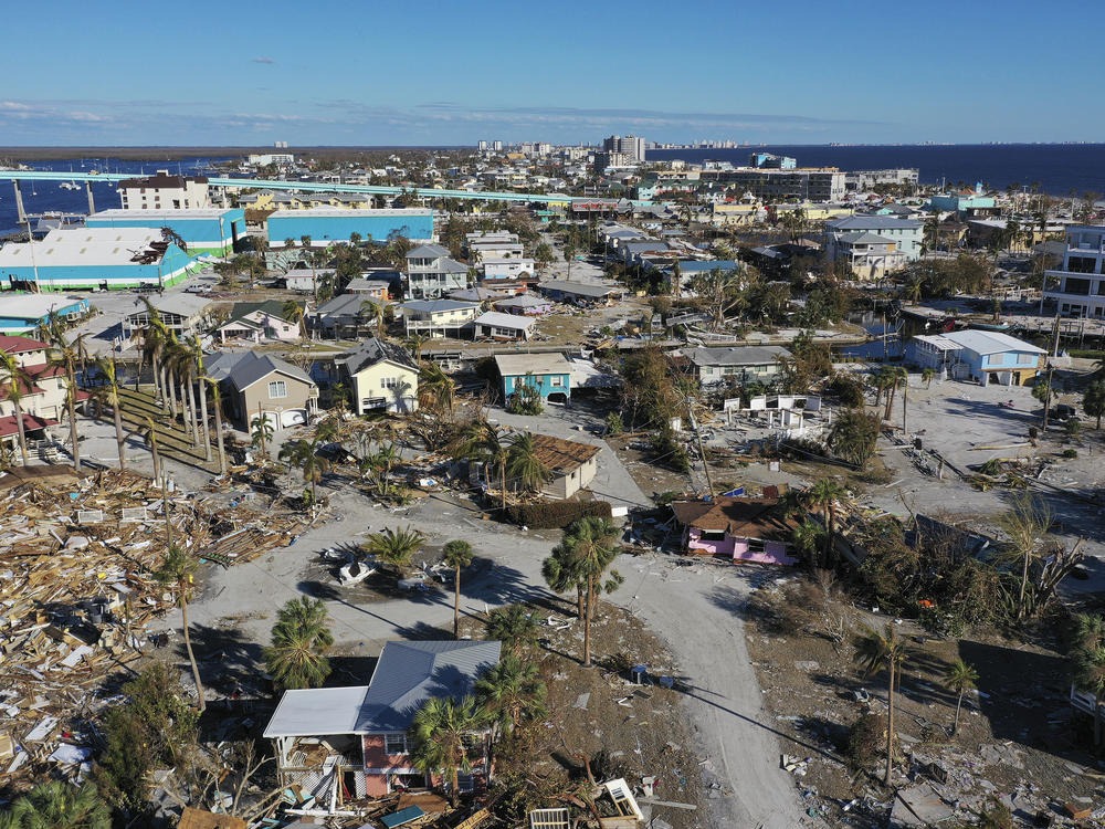 In this aerial view, the destruction left in the wake of Hurricane Ian is shown on Oct. 2, 2022, in Fort Myers Beach, Fla. The state's home insurance market is reeling after disasters like this one.