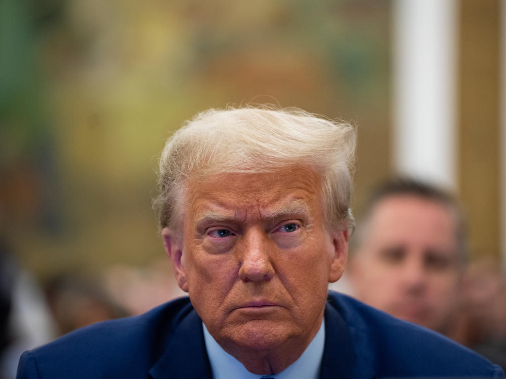 Former President Donald Trump during a trial in New York on Tuesday. A judge in a different case — happening in Washington, D.C. — issued a limited gag order that the ACLU said sweeps too broadly in restraining Trump's speech.