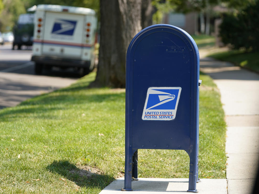 A United States Postal Service mailbox stands along Bonnie Brae Boulevard Monday, Aug. 17, 2020, in southeast Denver.