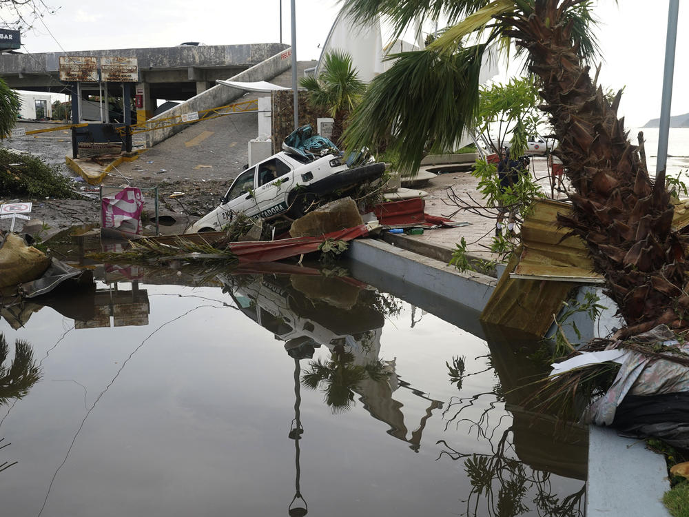 A street is strewn with debris on Wednesday after Hurricane Otis ripped through Acapulco, Mexico.