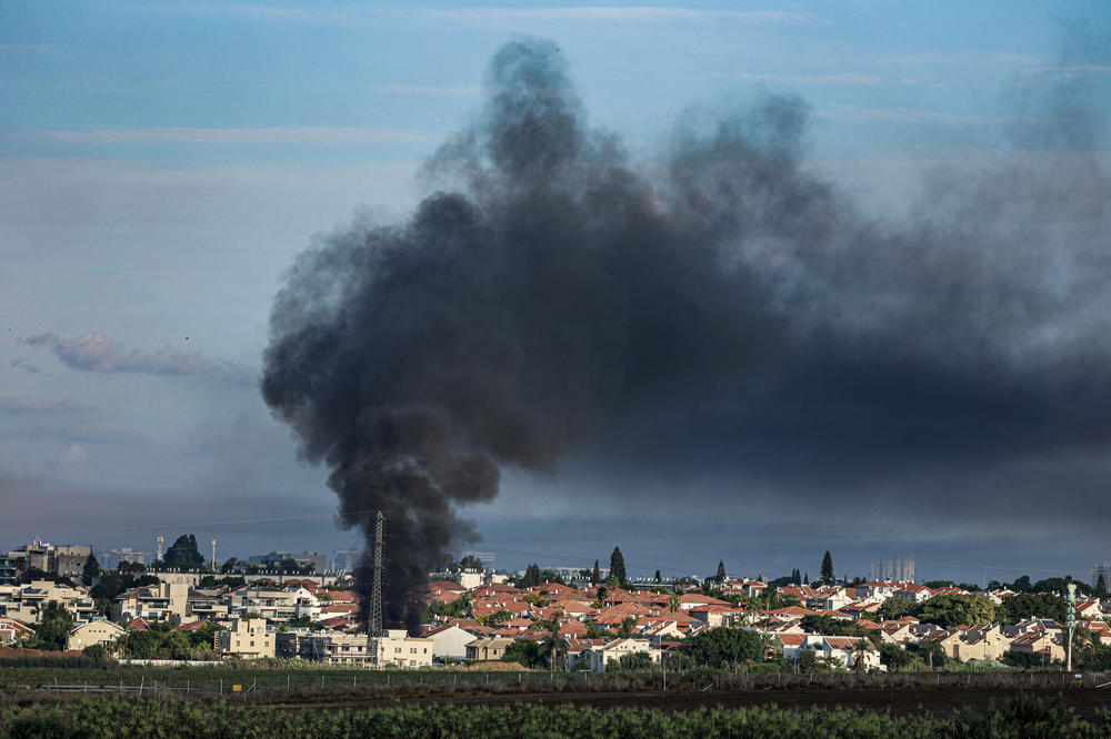 Smoke billows from Israel following a rocket a from Gaza City on Oct. 7.