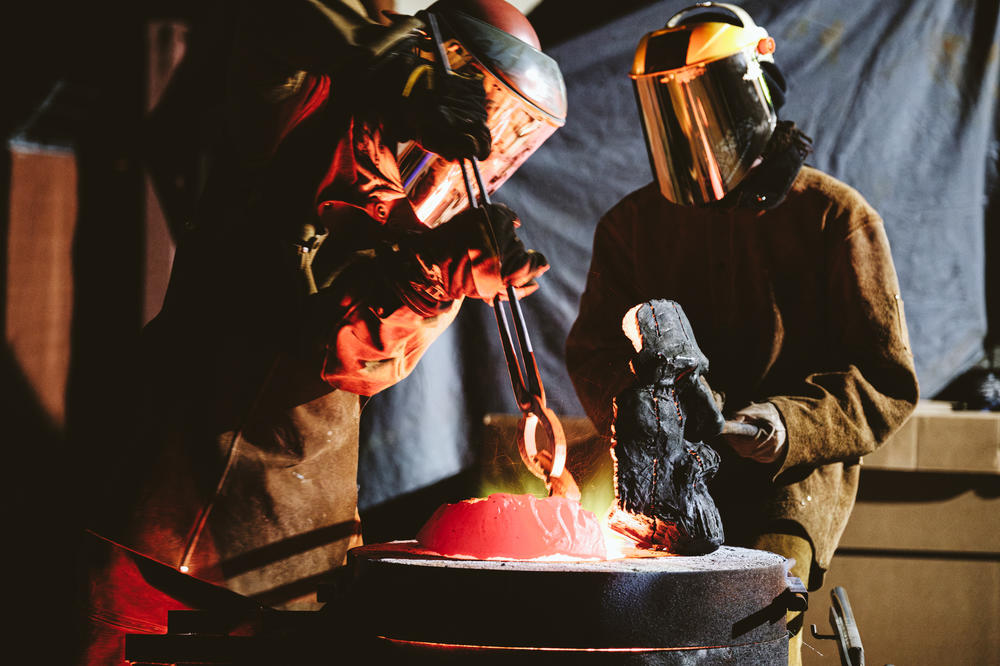 Workers at a foundry heat pieces of the Robert E. Lee statue. It is being melted down and poured into ingots which will later be used to create a new art exhibition in Charlottesville, Va.