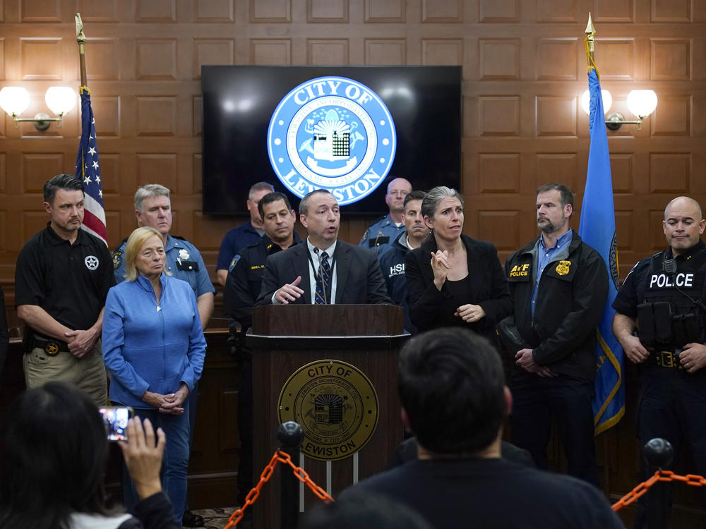 Maine Commissioner of Public Safety Mike Sauschuck speaks during a news conference Friday night in the aftermath of the mass shooting in Lewiston, Maine.