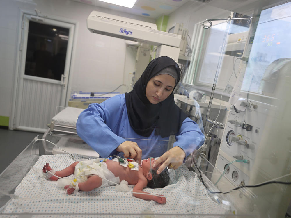 This newborn at Gaza's Nasser Hospital was delivered after their mother was killed in an Israeli airstrike on Oct. 24. The doctor said the baby is now in stable condition.