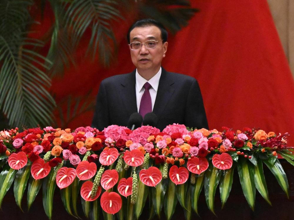 Chinese Premier Li Keqiang is shown speaking during a reception at the Great Hall of the People on the eve of China's National Day in Beijing on September 30, 2022.