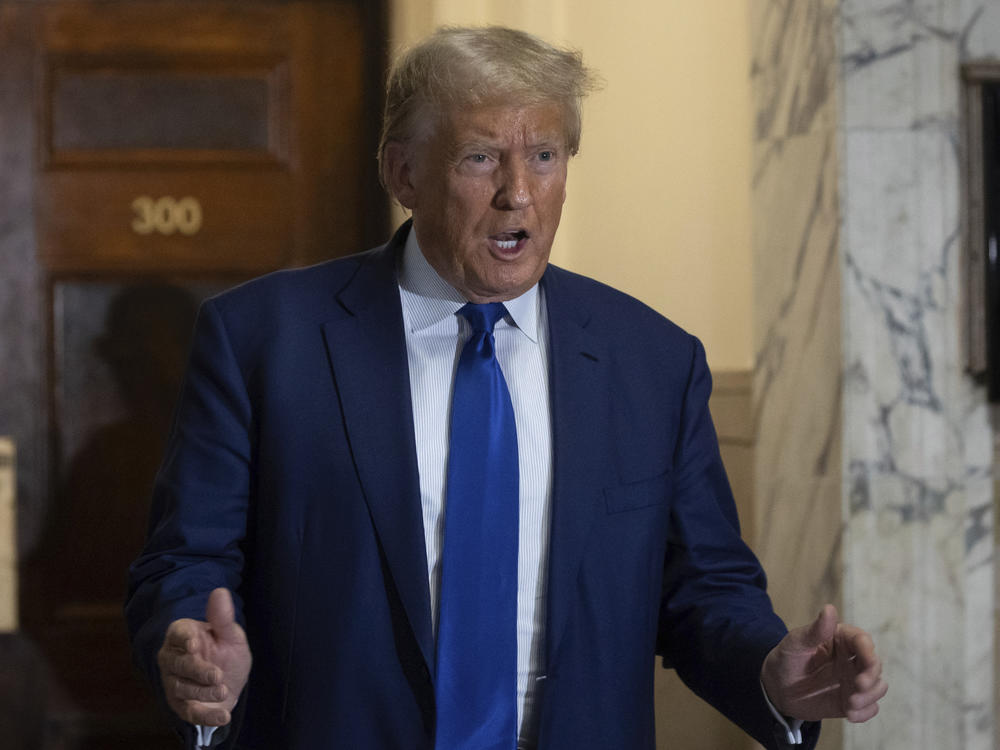 Former President Donald Trump arrives at the courtroom for his civil business fraud trial at New York Supreme Court on Oct. 25, 2023.