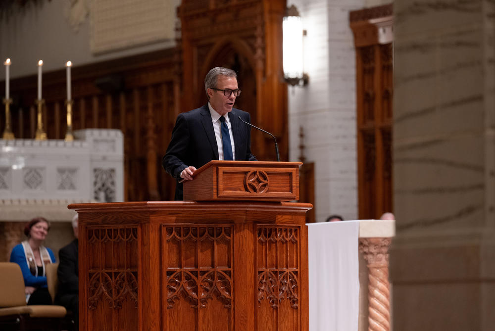 NESN sportscaster and anchor Tom Caron, a Lewiston native, speaks at the vigil.