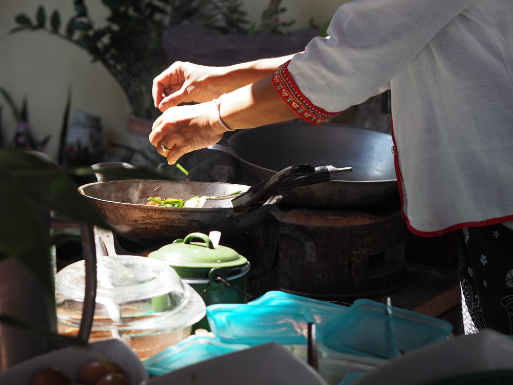 Worldwide, women cook nearly nine meals a week on average, while men cook only four, according to a new survey.
