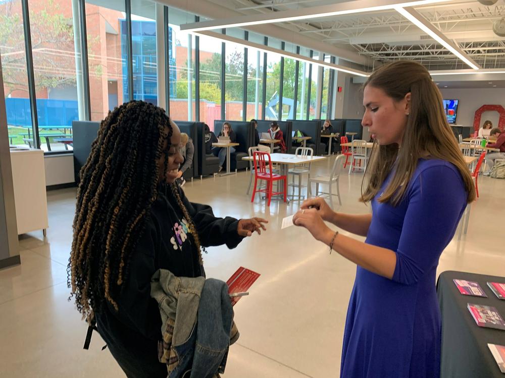Nursing student Ariana Allen, left, talks with Allison Stump, Students for Life Coordinator with Catholic Charities Diocese of Toledo, about Issue 1, on the Lima campus of The Ohio State University.