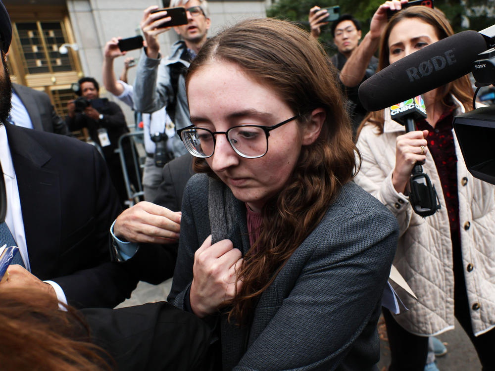 Caroline Ellison, the former head of Alameda Research, leaves Manhattan Federal Court in New York City after testifying during Bankman-Fried's trial on Oct. 10, 2023. Ellison was among the prosecutors' witnesses who testified that Bankman-Fried had directed them to commit crimes.