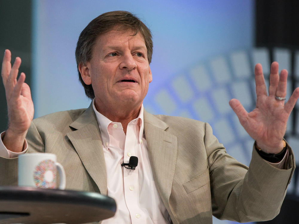 Author Michael Lewis speaks at an IMF and World Bank event in Washington, D.C., on Oct. 9, 2016. Lewis, who's just written a book about Bankman-Fried, was one of the well known people who attended the former FTX CEO's testimony.