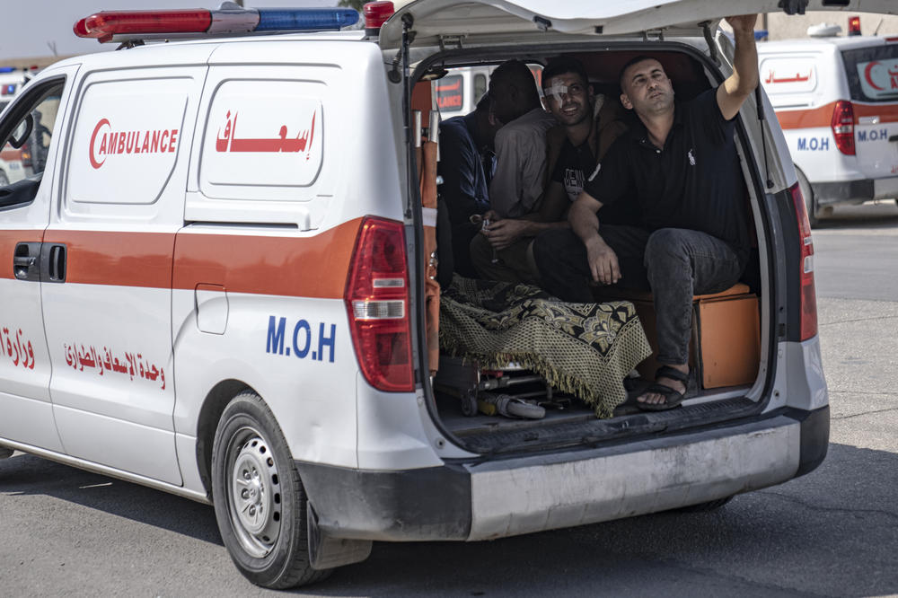 Ambulances with Palestinians wounded in the Israeli bombardment of the Gaza Strip arrive at Rafah border crossing to Egypt.