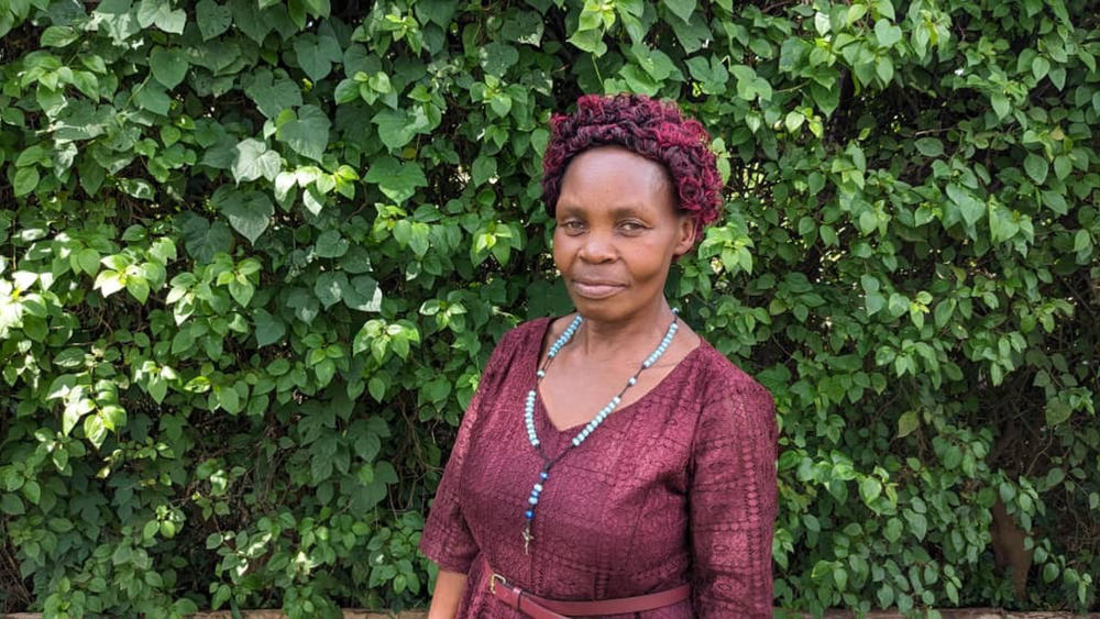 Jane Florence Kalenda, a mother of four, recently received $1,800 in no-strings cash from Give Directly. It's part of its study to see if the grants allow residents to find new, safer homes, off the risky slopes of Mount Elgon.