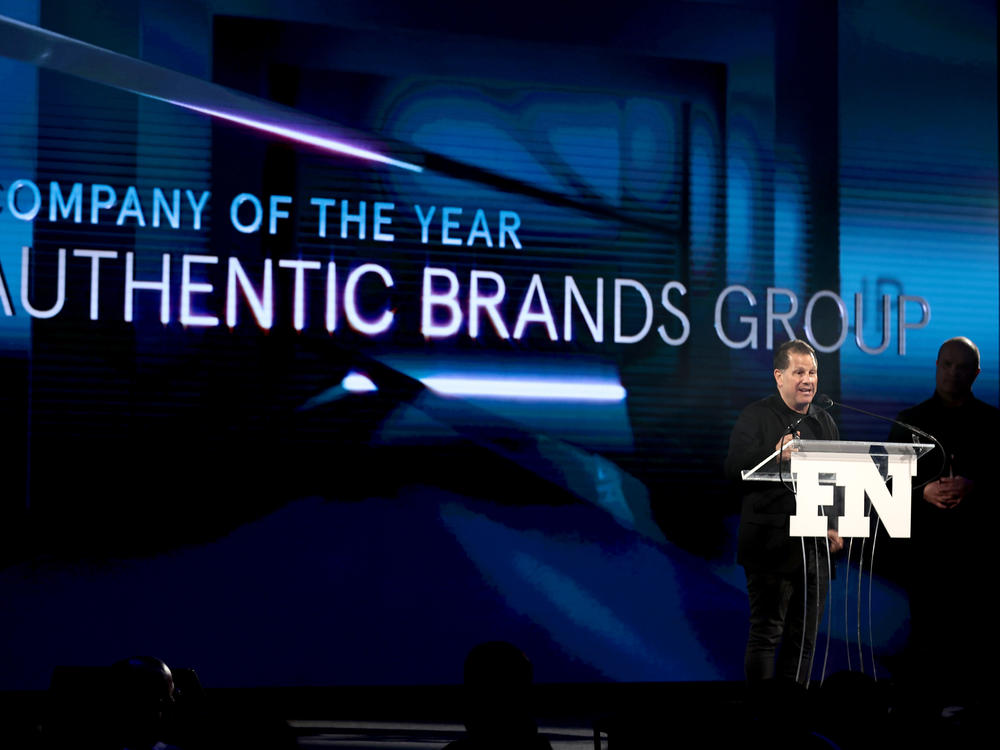 Authentic Brands Group CEO Jamie Salter accepts a Footwear News Achievement Award in 2021. That year, his firm said it would buy the Reebok brand from Adidas.