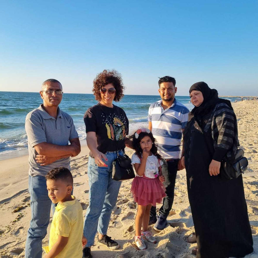 Dr. Lina Qasem Hassan (second from left), a Palestinian citizen of Israel who treats Jewish patients, got terrible news: A relative in Gaza who drives an ambulance was killed in an Israeli airstrike. She says she feels the pain on both sides of the conflict.