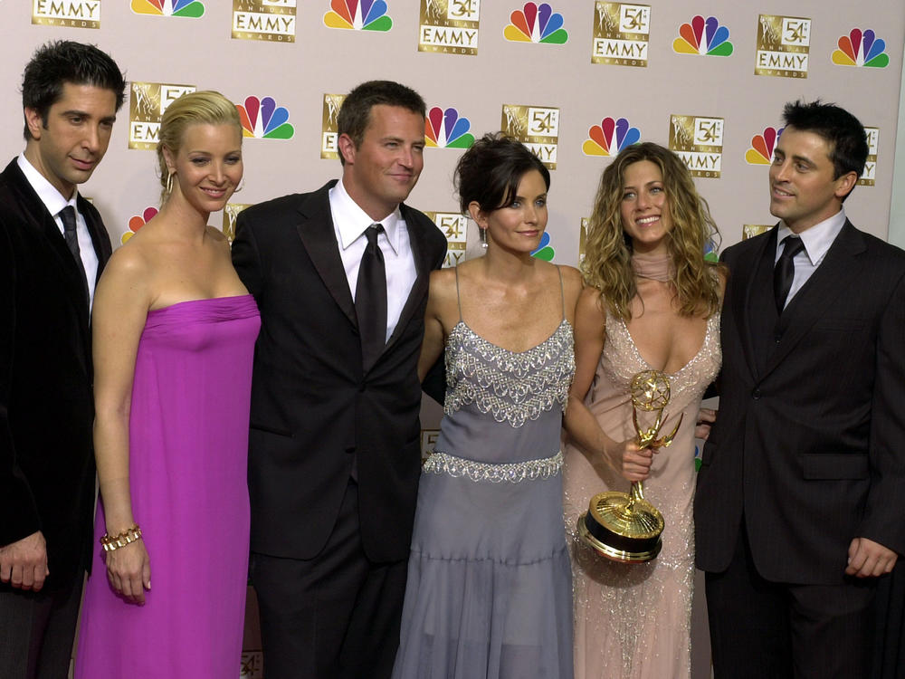 The stars of <em>Friends</em>, from left, David Schwimmer, Lisa Kudrow, Matthew Perry, Courteney Cox Arquette, Jennifer Aniston and Matt LeBlanc pose after the show won outstanding comedy series at the 54th Annual Primetime Emmy Awards in 2002.