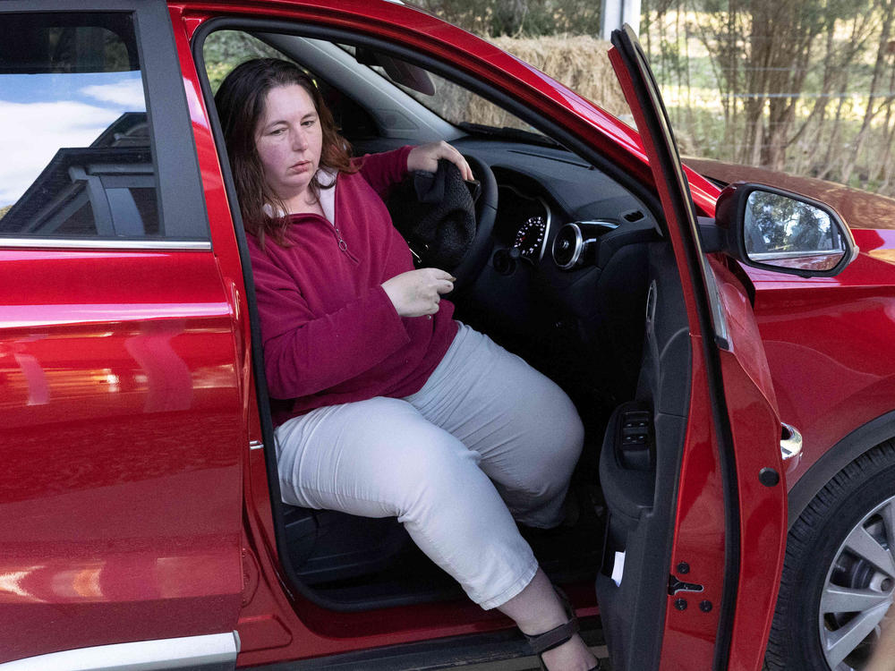 Erin Patterson was arrested and charged with multiple murders on Thursday. She is seen here arriving at her home in Leongatha, Victoria, in August.
