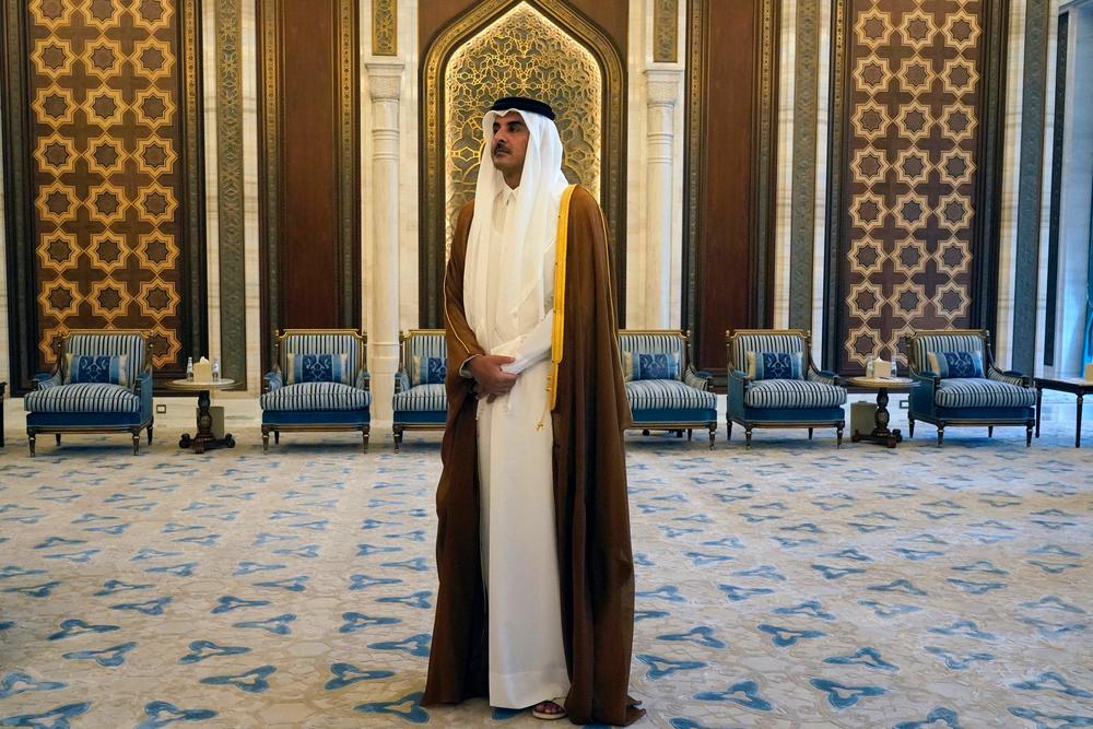 Qatar's Emir Sheikh Tamim bin Hamad al-Thani waits for U.S. Secretary of State Antony Blinken in Lusail, Qatar, on Oct. 13.