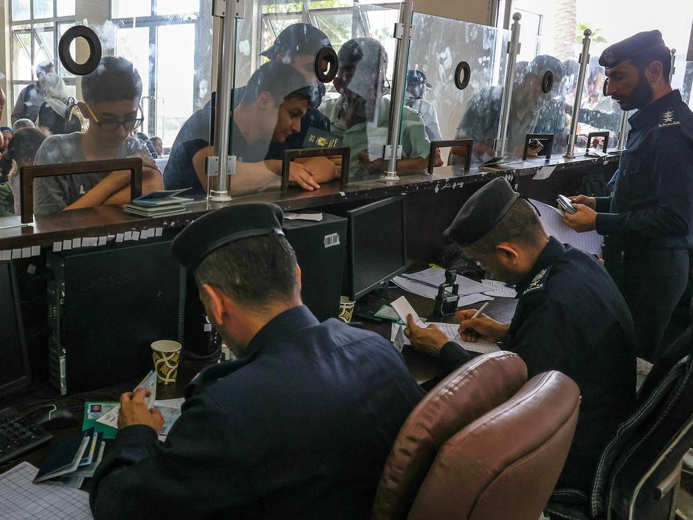 At least 300 civilians, all of them foreign citizens or dual nationals, departed Gaza Wednesday, and hundreds more were expected to leave Thursday.