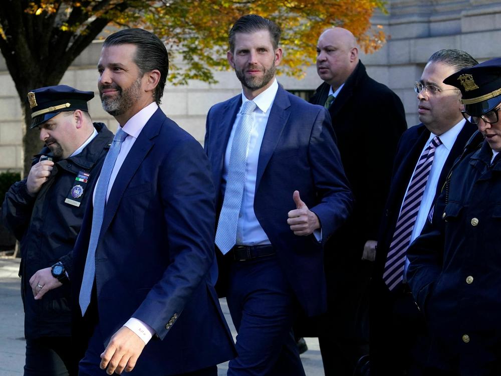 Donald Trump Jr. and his brother Eric Trump arrive at New York Supreme Court for former President Donald Trump's civil fraud trial on Thursday in New York City.