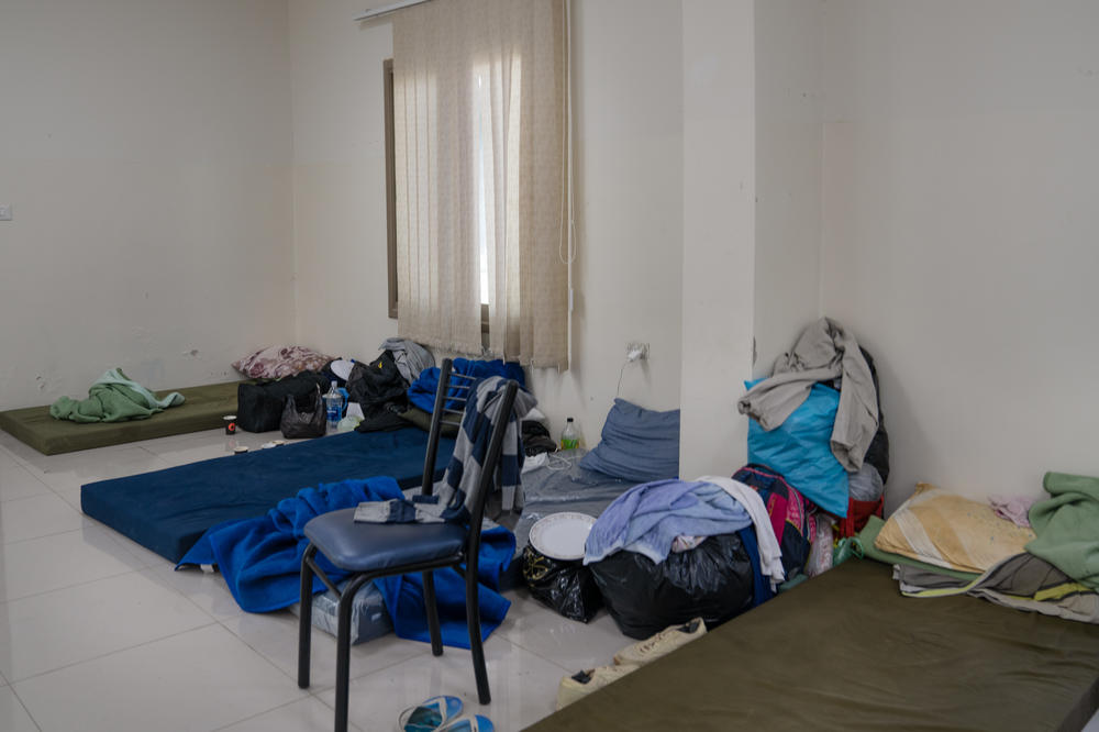 Mattresses for displaced workers from Gaza line the floor in a room at Al-Istiqlal University in Jericho.