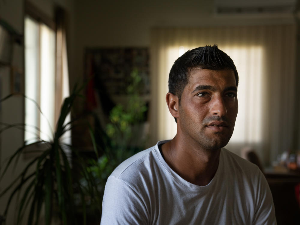 Ibrahim Alfarany has been staying at Al-Istiqlal University for several weeks. He usually works and lives near a store south of Tel Aviv, where he stocks vegetables for a few weeks at a time, and travels back to Gaza.