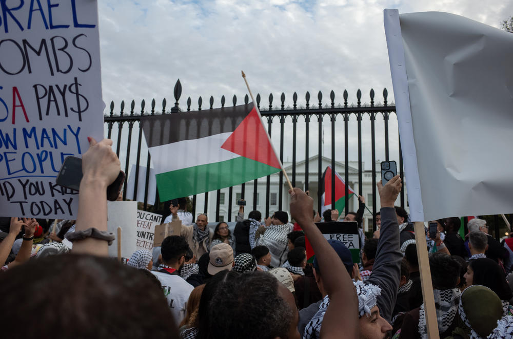Protesters gather outside the White House on Saturday. President Biden has requested more than $14 billion in military aid for Israel.