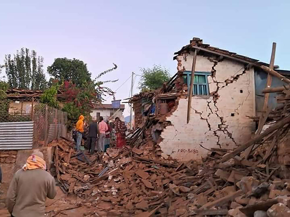 This handout photo provided by Nepal Prime Minister's Office shows an earthquake-affected area in northwestern Nepal on Saturday. Helicopters and ground troops rushed to help people hurt in a strong earthquake that shook northwestern Nepal districts just before midnight Friday.