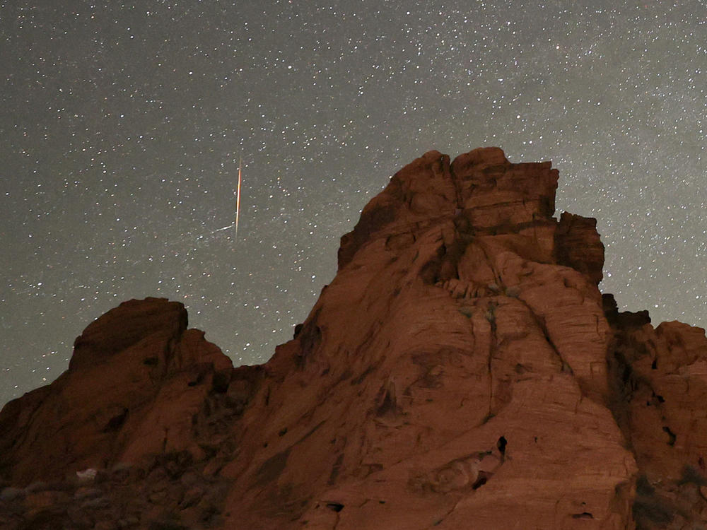 A meteor from the Tau Herculids meteor shower passes over Valley of Fire State Park in Nevada on May 30, 2022. A meteor shower known for producing fireballs, the Southern Taurids, is expected to peak this week.