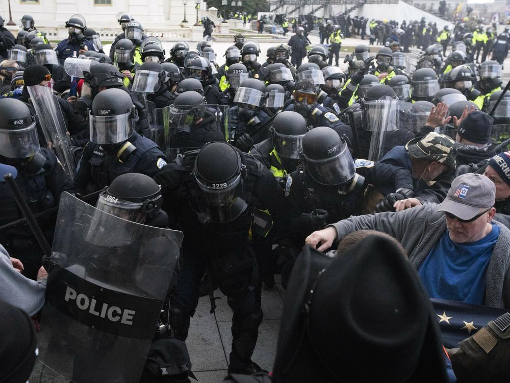 In this Jan. 6, 2021, file photo, U.S. Capitol Police push back rioters trying to enter the U.S. Capitol in Washington.