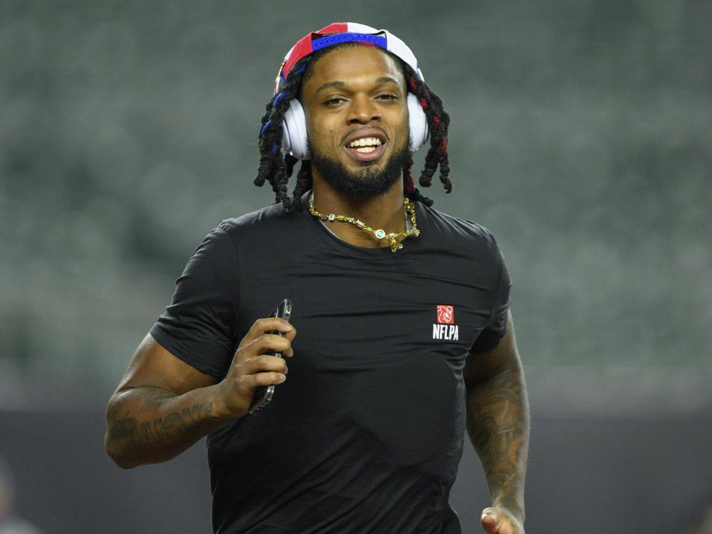 The Buffalo Bills' Damar Hamlin took 10 Cincinnati medical workers out for dinner — and told them he's setting up scholarships in their names. He's seen here before the Bills' game against the Cincinnati Bengals.