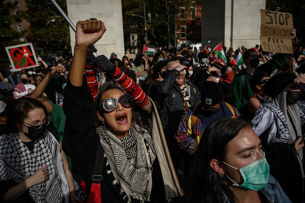 NYU students participate in a walkout at Washington Square park in New York on Oct. 25.