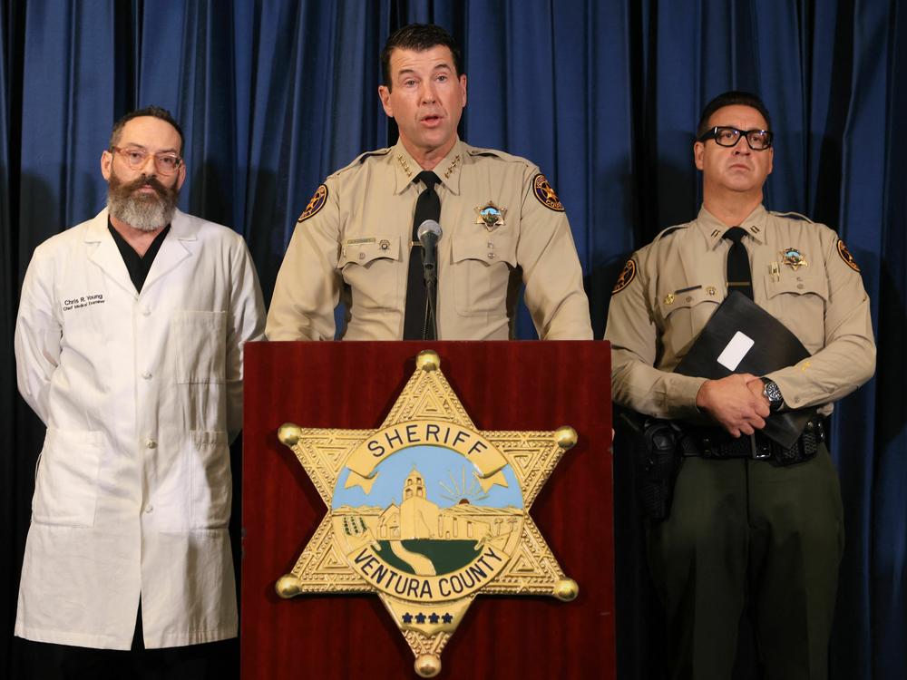 Ventura County Sheriff James Fryhoff (center) speaks during a press conference in Thousand Oaks, California on Tuesday. Ventura County Chief Medical Examiner Dr. Christopher Young stands to his left.