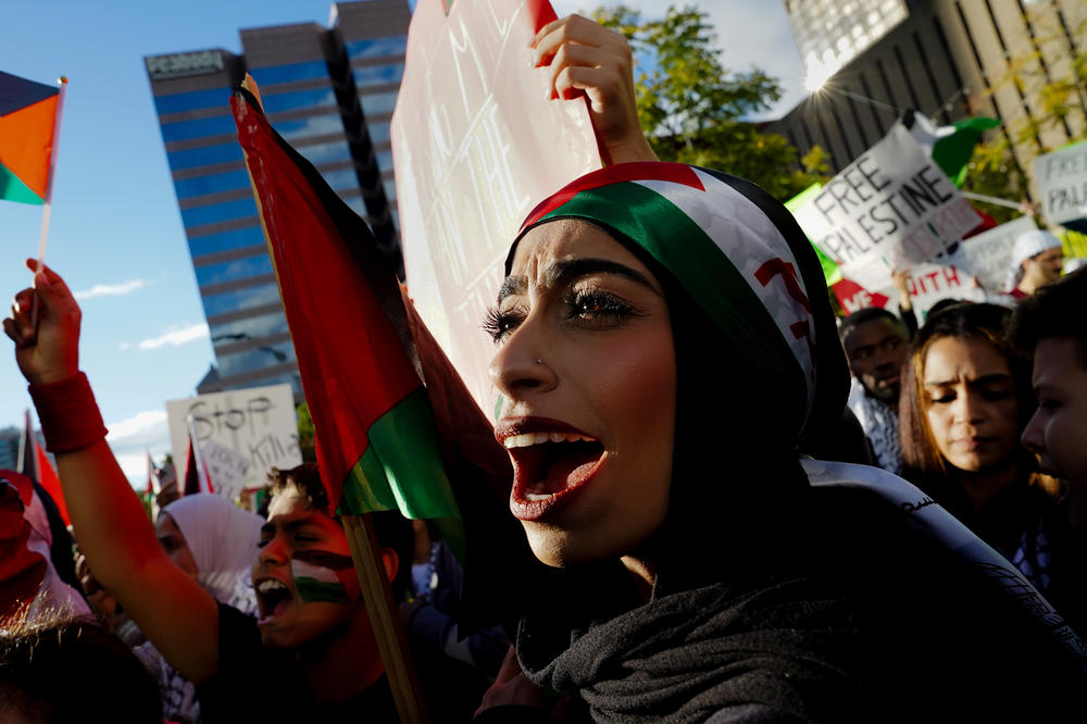 Lamya Abukanan, 23, Ballwin, Mo., participates in a pro-Palestinian rally as tensions and the death toll rise in Israel and the Gaza Strip on Sunday, Oct. 15, 2023, at Kiener Plaza in downtown St. Louis.