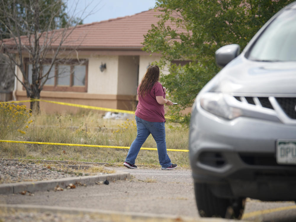 The Return to Nature funeral home is marked off with police tape on Oct. 6 in Penrose, Colo.