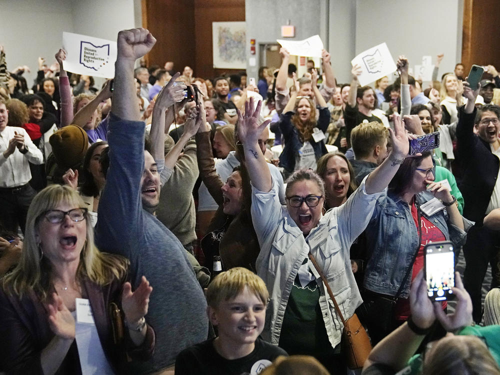 Supporters for a pro-abortion ballot measure cheer as they watch election results come in on Tuesday in Columbus, Ohio.