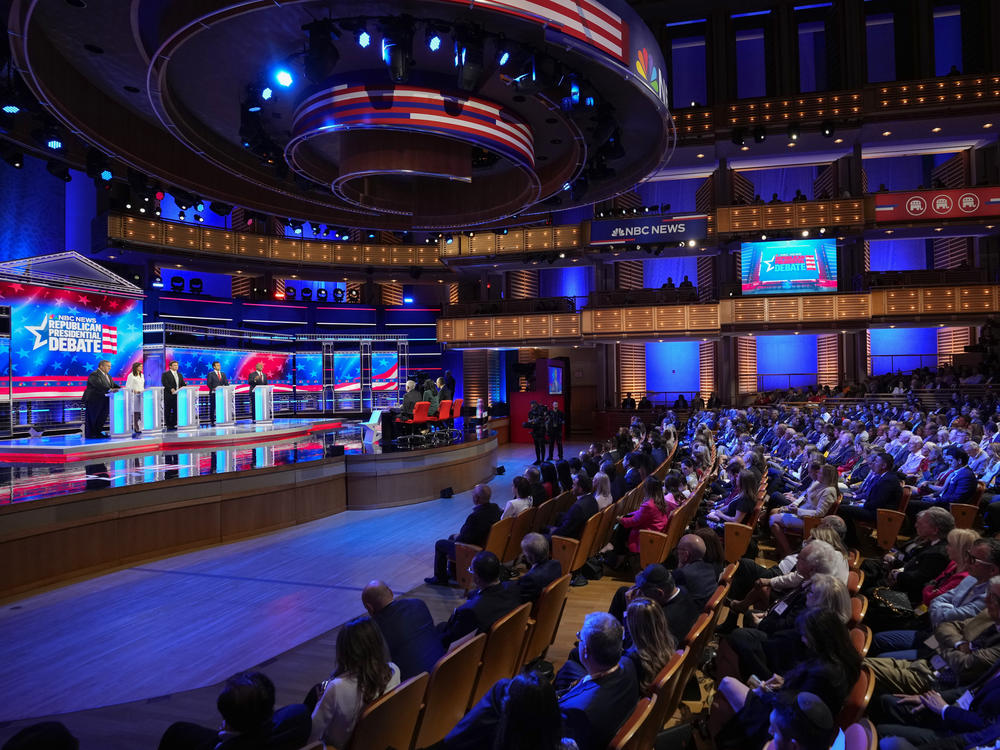 Republican presidential candidates from left, former New Jersey Gov. Chris Christie, former U.N. Ambassador Nikki Haley, Florida Gov. Ron DeSantis, businessman Vivek Ramaswamy and Sen. Tim Scott, R-S.C., participate in a Republican presidential primary debate hosted by NBC News Wednesday in Miami.