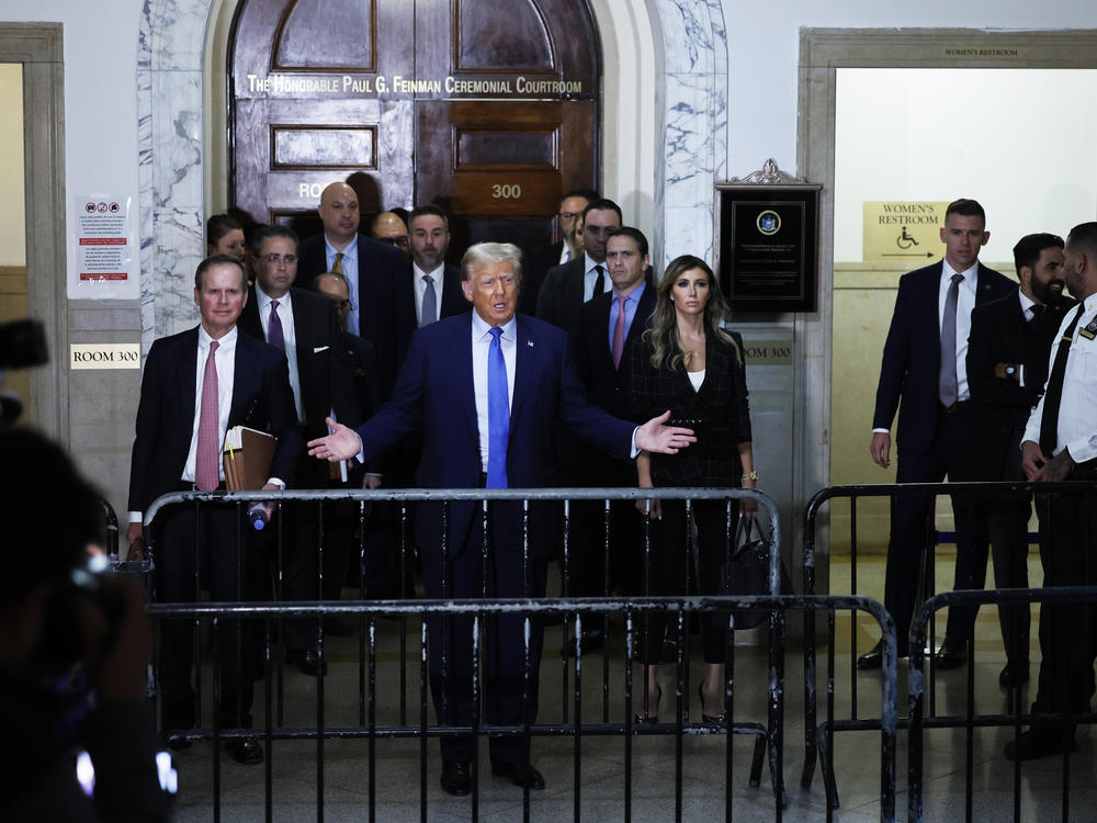 Former President Donald Trump speaks to members of the media after testifying at his civil fraud trial at New York State Supreme Court on Monday in New York City.