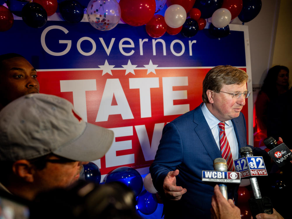 Mississippi Gov. Tate Reeves speaks to members of the press in Flowood, Mississippi after winning reelection on Tuesday.