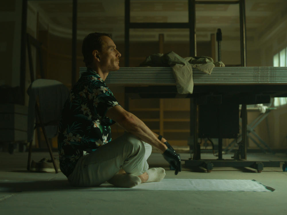 Michael Fassbender plays an assassin on the run in <em>The Killer.</em>