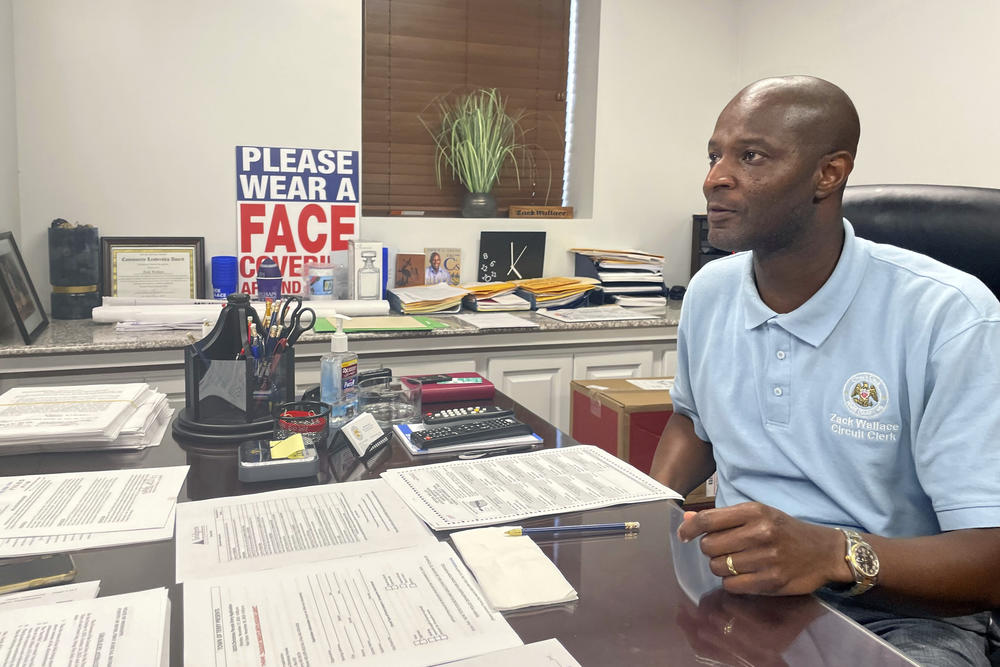 Circuit Clerk Zack Wallace, the top election official in Hinds County, speaks to The Associated Press at his office Wednesday, Nov. 8, 2023, in Jackson, Miss. Wallace said his office began receiving reports of ballot shortages on Tuesday afternoon, and had to scramble to print more.