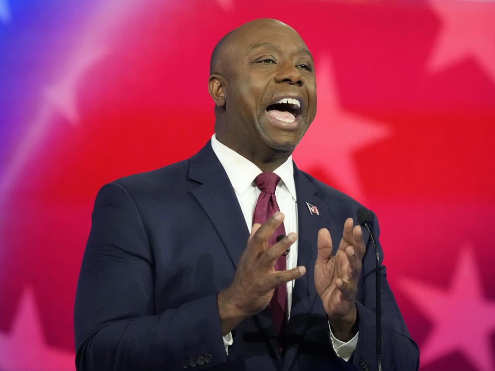 Republican presidential candidate Sen. Tim Scott, R-S.C., speaks during a Republican presidential primary debate hosted by NBC News on Wednesday in Miami.