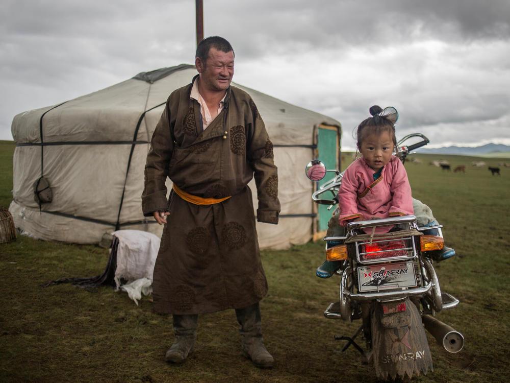 Grandfather and granddaughter outside the family ger â or yurt. A study of Mongolians studied living in gers showed higher rates of satisfaction than those living in urban housing, a finding the authors relate to the Mongolian emphasis on nature and freedom.