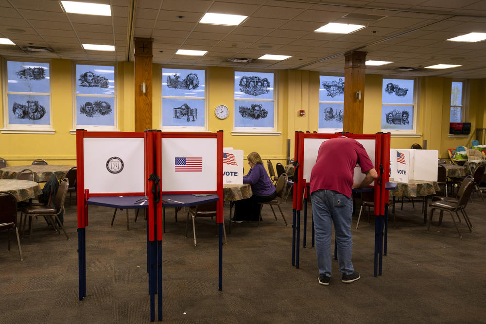 Voters cast ballots in Louisville, Ky., this week. In recent years, local election officials have come to rely a variety of mechanisms to share information about rumors and conspiracy theories about elections.