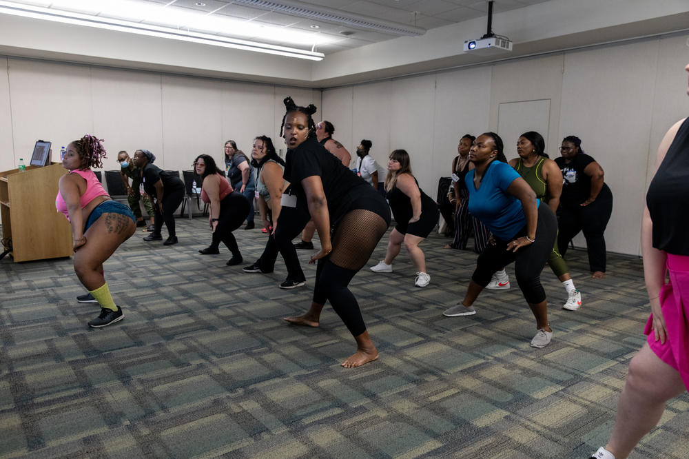 Assétou Xango participates in the Twerk-lesque class. The convention offered five wellness classes for attendees to choose from.